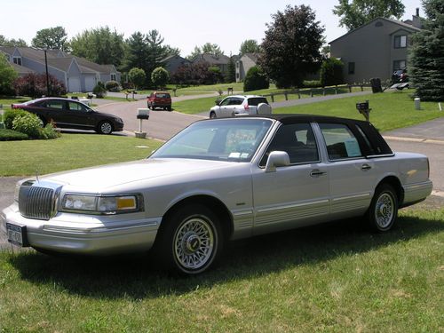 Only 64k miles!  1996 lincoln town car executive.  runs great! good condition!