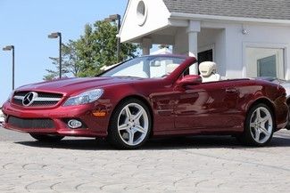 Storm red auto msrp $115,415.00 only 3,134 miles one owner like new perfect
