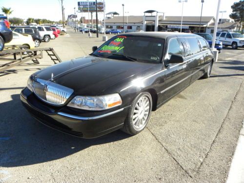 Stretched limousine, chauffeur, leather, entertainmet system, vinyl roof