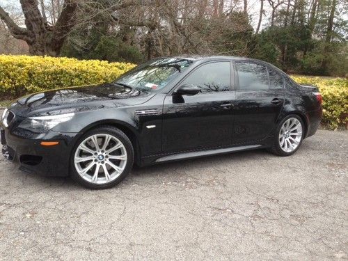 Like new -black on black -bmw m5 with rare 6 speed manual transmission