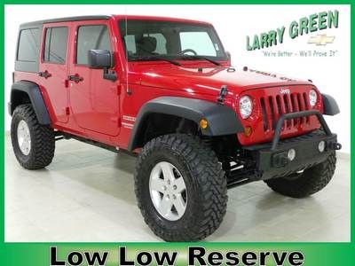 Unlimited auto,warranty lifted, 35's red 4 door cold ac new tires 4x4 financing