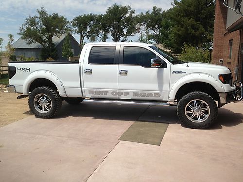 2013 ford f-150 *lifted* rmt package only 4700 miles!!