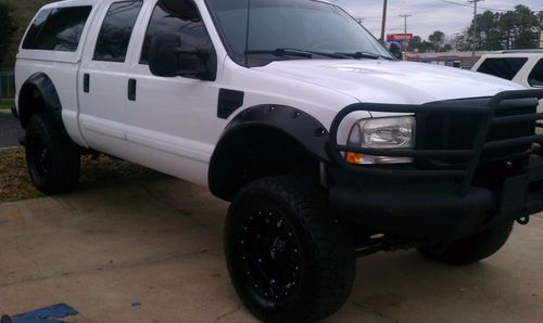 2002 ford f-250 lariat 7.3l diesel 4wd 6" icon lift, 37" terra grapplers on 20"