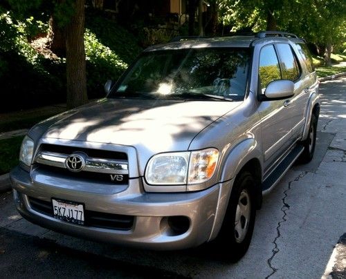 Silver 2005 toyota sequoia sr5 with low miles. leather seats!