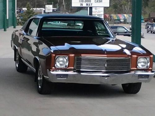 Copper exterior w/ black interior, original 123,000 miles 2 door vinyl top