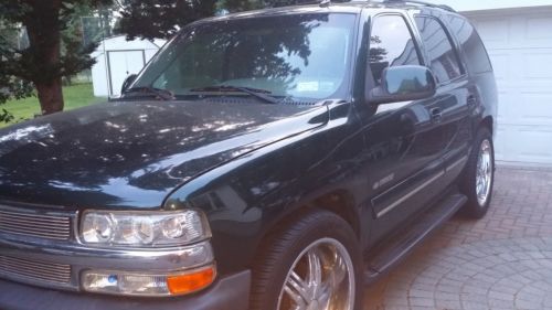 Green tahoe, 187,000 miles, 2002 w/3rd seat and extra set of 22inch. chrome rims