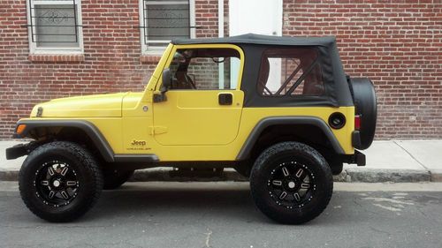 !price reduced! 3'' lift yellow jeep wrangler