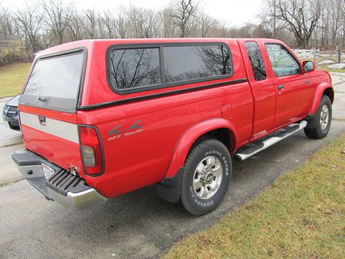 2000 nissan frontier extended cab 4 wheel drive pickup. 95,000 miles