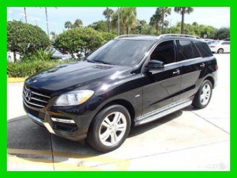 2012 ml350 4matic, panoroof, brownleather, 2 tvs/dvd,cpo 100,000 mile warranty!!