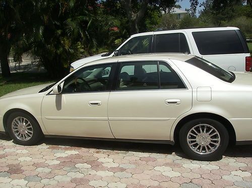 2003 cadillac deville dhs,florida 1 owner,pearl white,low miles for year,