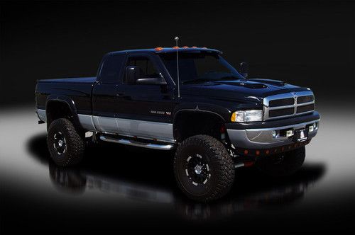 2002 dodge ram 2500 quad cab 4x4. custom. one owner. only 29,734 miles. wow!!!!