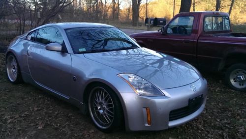 Silver, base model, custom fit dual exhaust, 6 speed manual, fun and fast!!