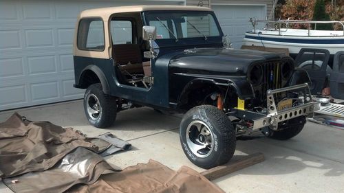 1983 jeep cj7 fiberglass, new frame, ss everything, powder coated everyting else