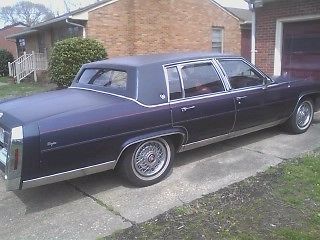 1988 cadillac fleetwood brougham,very good condition,blue exterior,red leather