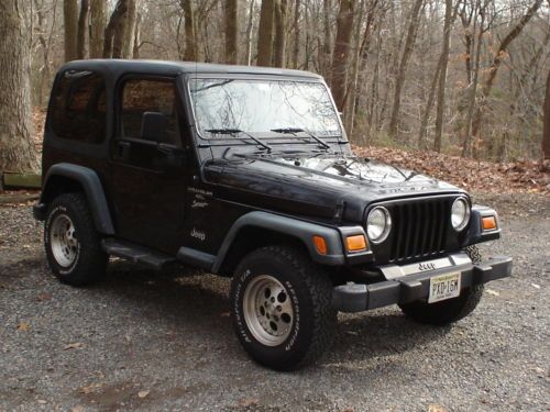 1999 jeep wrangler sport 4.0 liter v-6 hardtop removable air conditioning 4wd