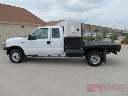 06 f350 sleeper/flatbed 4x4 powerstroke well maintained tx-owned extra fuel tank