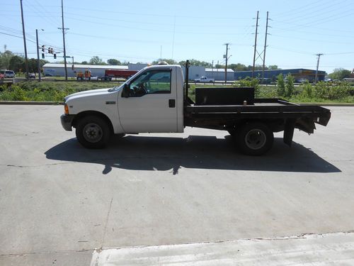 1999 ford f350 super duty with flatbed, duel rear wheel, power and air,tool boxs