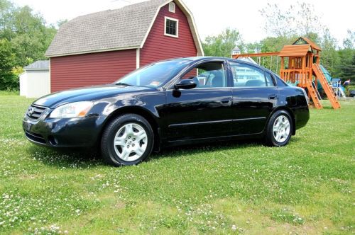 No reserve..112k miles on this 2002 nissan altima s 2.5 liter 4 cyl,new tires,cd