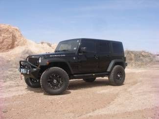 2012 black rubicon 4x4, 12,000 miles loaded with upgrades. texas