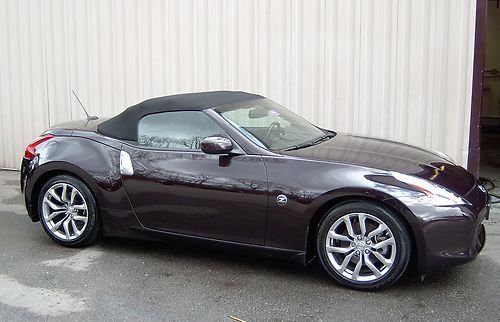 2010 nissan 370z touring convertible with only 7k miles !!!!