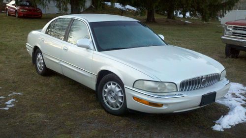1999 buick park avenue ultra loaded in pearl white  no reserve