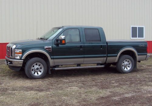 2010 ford f-250, crew cab, green/tan in color, ordered new,factory dvd, perfect!