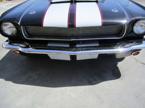 1965 ford mustang coupe with eleanor bullitt shelby style body kit. project car