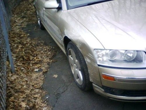 2004 audi a8 l quattro only 74k miles runs and drives has skin damage on side