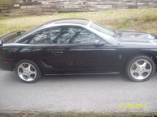 1997 mustang cobra svt black on black leather super clean,exceptionally nice