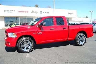 Save at empire dodge on this new quad cab express hemi 4x4 with 20's