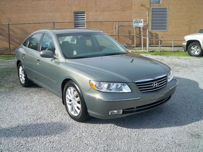 Limited. v6, leather, 1 owner, sunroof, michelin tires. green with tan interior.