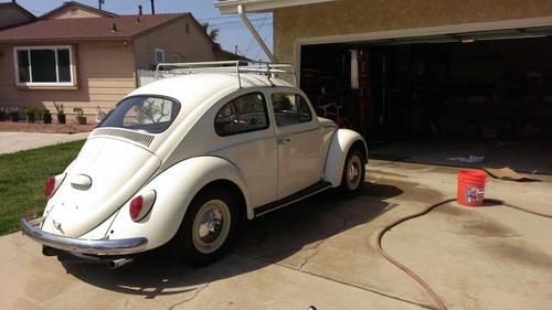 Clean 1964 vw bug with roof rack