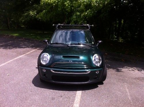 2006 mini cooper s in british racing green over a two toned gray interior with o