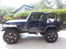 2000 jeep wrangler  4x4 midnight blue, lift kit, big tires, premium sound system