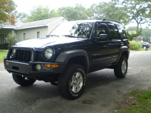 2003 jeep liberty sport,lifted suspension,custom bumper,loaded