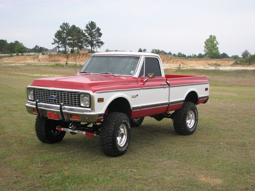 1972 chevy c-10 red and white 4x4 fleet side