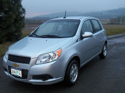 2011 chevrolet aveo  hatchback 4-door 1.6l 17mo or 32,000mi warranty