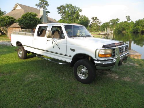 White crew cab long wheel base, body is in very good condition