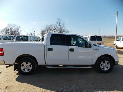 Xlt triton 4 door f-150 w/cap and running boards. beautiful and runs great!