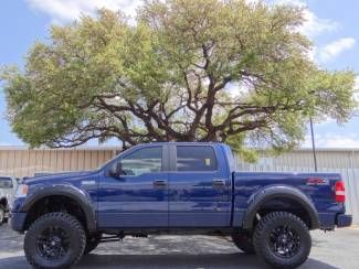 Lifted blue crew cab fx4 5.4l v8 4x4 fuel leather we finance we want your trade
