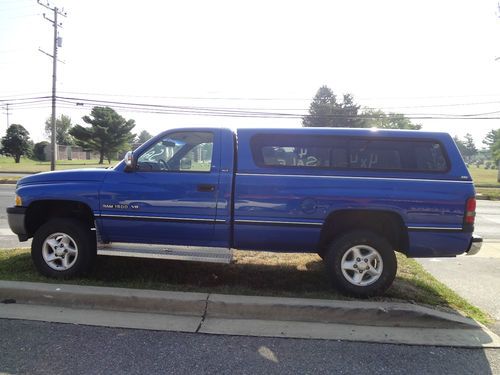 1997 dodge ram 1500 4x4 with cap......only 85000 miles....runs great-ram