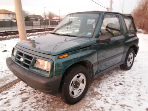 Chevy  geo tracker convertible 4 cyl 4spd  a/c p/s  p/b   &#034; no reserve&#034;