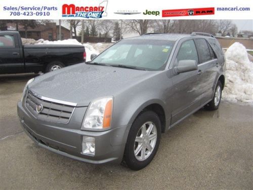 Grey srx suv 3.6l cd  leather woodgrain clean 3rd row seating  must sell