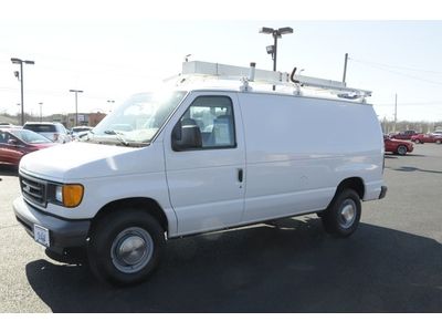 2006 ford e-350 cargo van loaded with shelves and racks