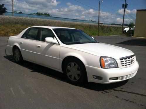 White 4 door sedan leather interior low miles for its year clean carfax