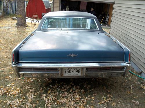 1966 lincoln continental 2-door couple