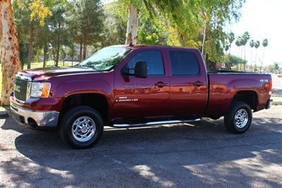 Low miles extra clean duramax diesel with toneau cover, leather, running boards