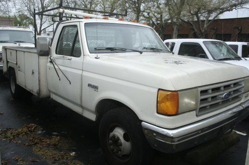 Ford 350 1991 utility truck with rack and side storage cabinets