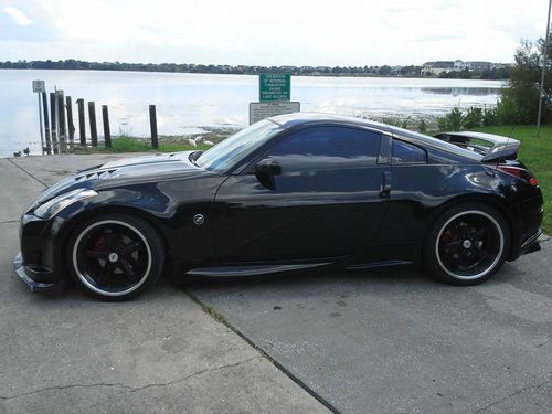 2003 nissan 350z carbon fiber and black must see