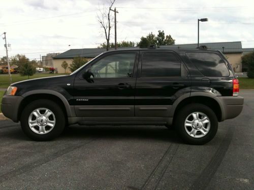 Black/graphite, 4x4, 6 cyc, auto, cd player, trailor hitch and much more